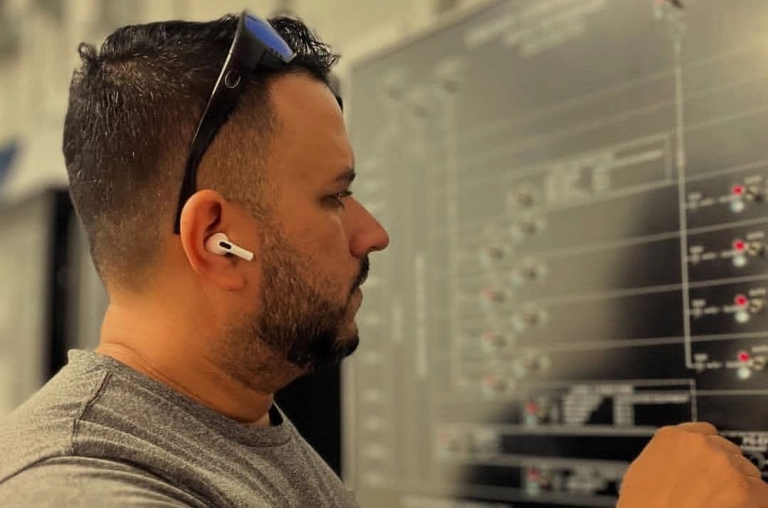 Osorio technician working at a smoke control panel